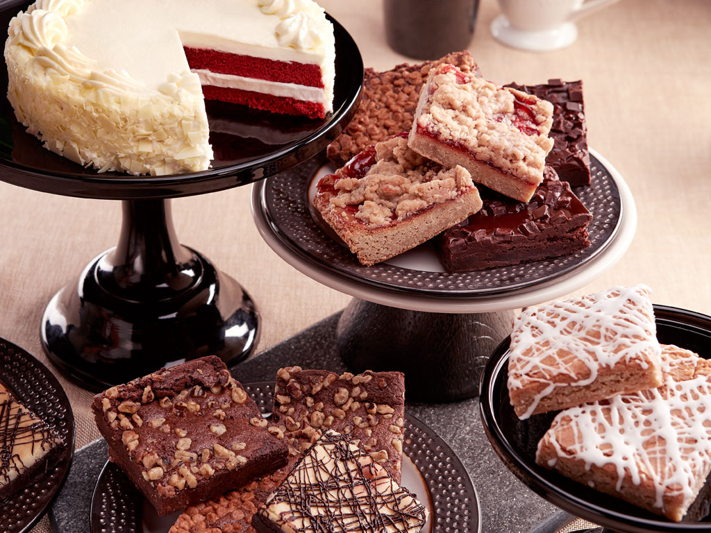Send this delicious combo gift and it'll be an instant crowd pleaser. Mouths will water over the array of goodies as recipients decide which dessert to try first. This combo gift includes a Bake Me A Wish cake of your choice (7-inch) and an 8-pc assorted Gourmet Brownie Sampler. Recipients will get to choose from their favorite brownie flavors including Velvet Ganache, Fudge Walnut, Peanut Butter Crunch, Iced Lemon Blondie, Raspberry Crumb and Cheesecake. Order online for nationwide delivery!